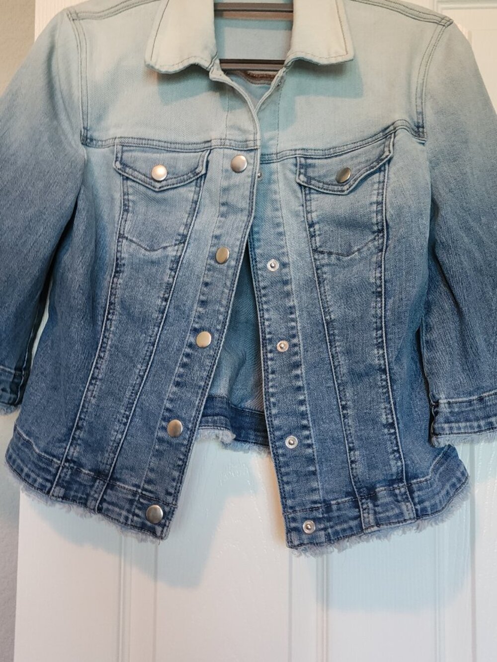 Chico Demin length/short jacket.  Sleeves and bottom of jacket w/fringe.
